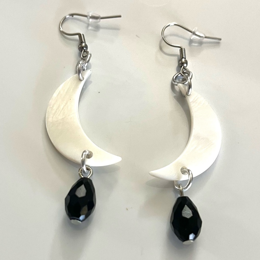 Handmade mother of pearl crescent moon earrings with dangly black drop beads